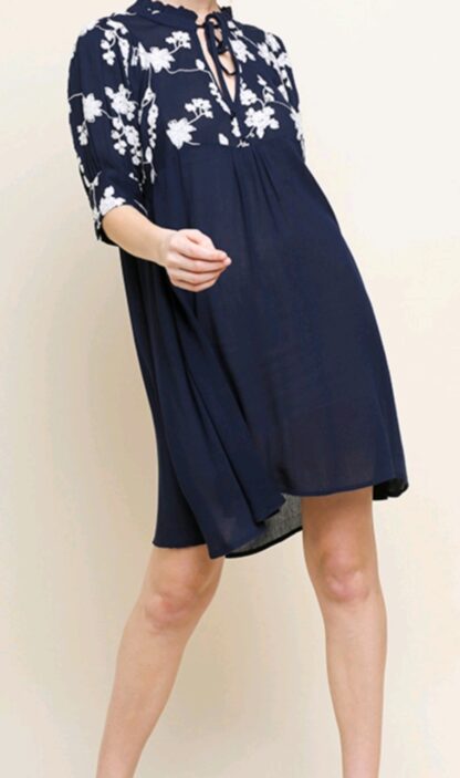 Navy dress with embroidered white flowers